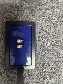14k gold earrings or necklace with a pearl