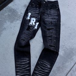 AMIRI JEANS BOLD LETTERING 