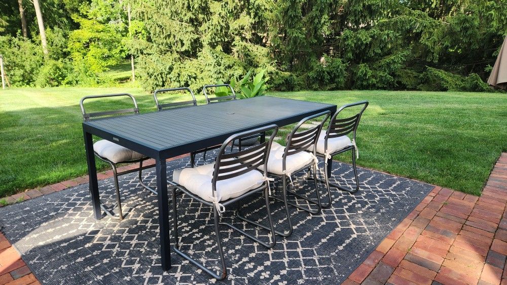 Crate & Barrel outdoor dining table with 6 RH chairs
