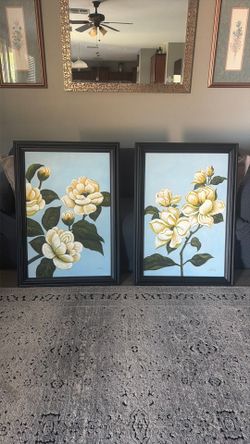 Beautiful picture of flower with black wooden frame