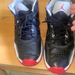 Grey Black Jordan's With Red And White Bottoms 