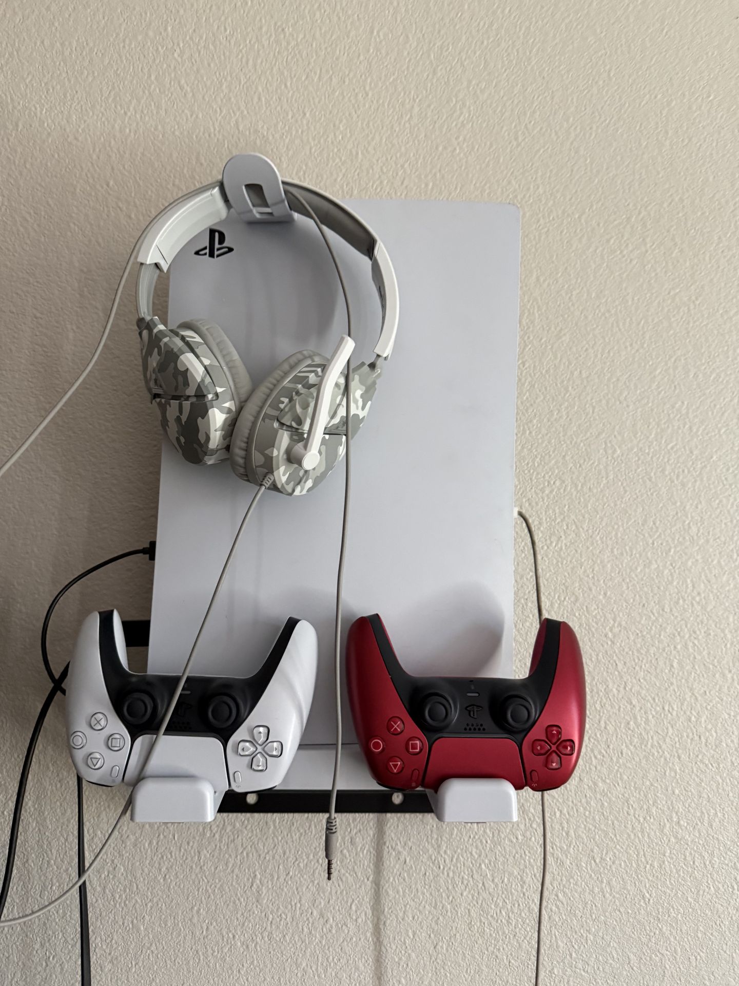 PS5 Slim with two controllers and headset includes PlayStation mount