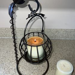Floating metal candle holder with vanilla new candle included