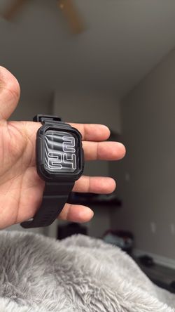 Apple Watch SE 3 with Black Rugged Case and Band