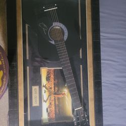 Signed guitar By Kenny Chesney 