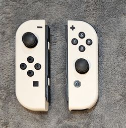White Nintendo Switch OLED Joy Cons