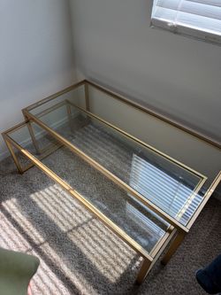 Glass tables with gold frame
