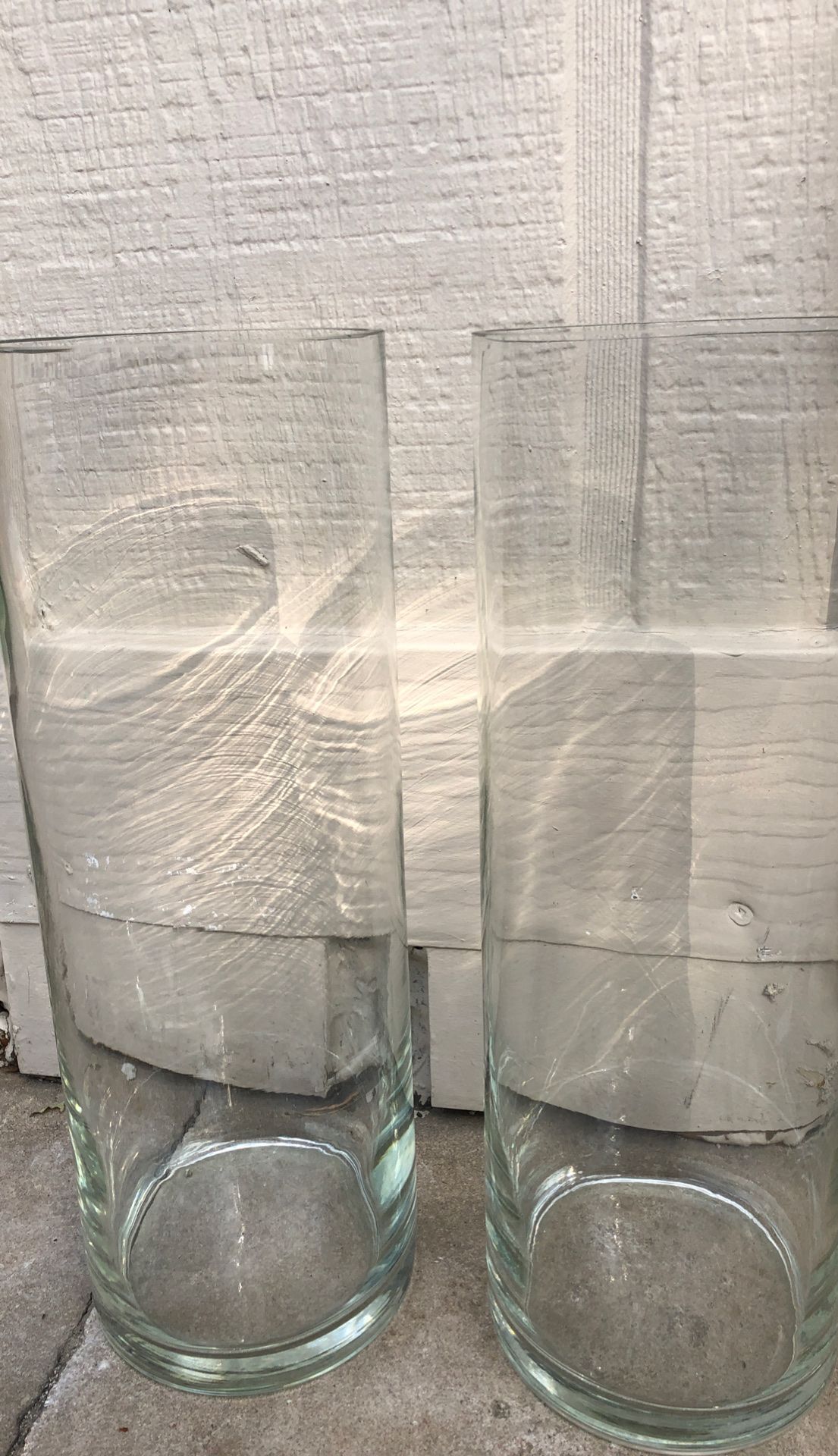 Two glass cylinder vases