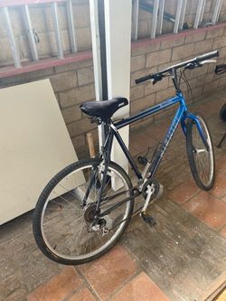Nishiki Blazer mountain bike. 21 speed. 26" wheels. 21.5" frame. Great for tall people.