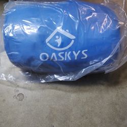 Oaskys sleeping bag Blue. New in package