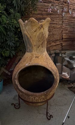 vintage or rustic Mexican-style clay chiminea