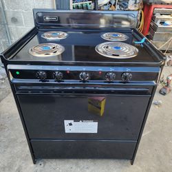 BROWN ELECTRIC STOVE 
