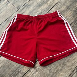 Red and white Adidas shorts adidas women’s size medium