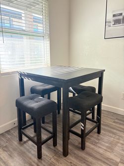 Dark wood dining table w/ stool