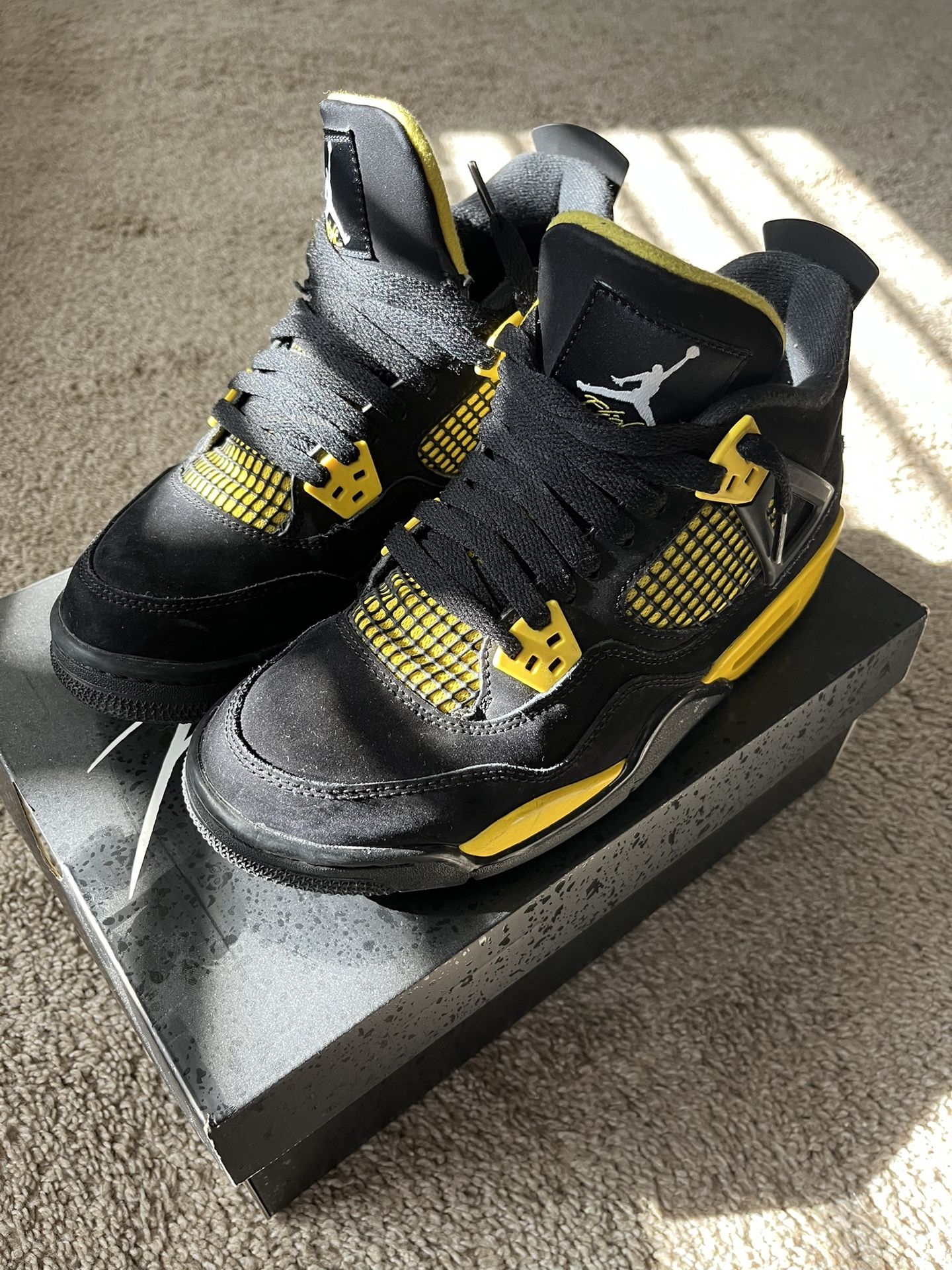 Air Jordan 4’s Yellow Thunder