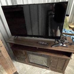 43” LG Smart Tv and Fireplace Stand W Remote