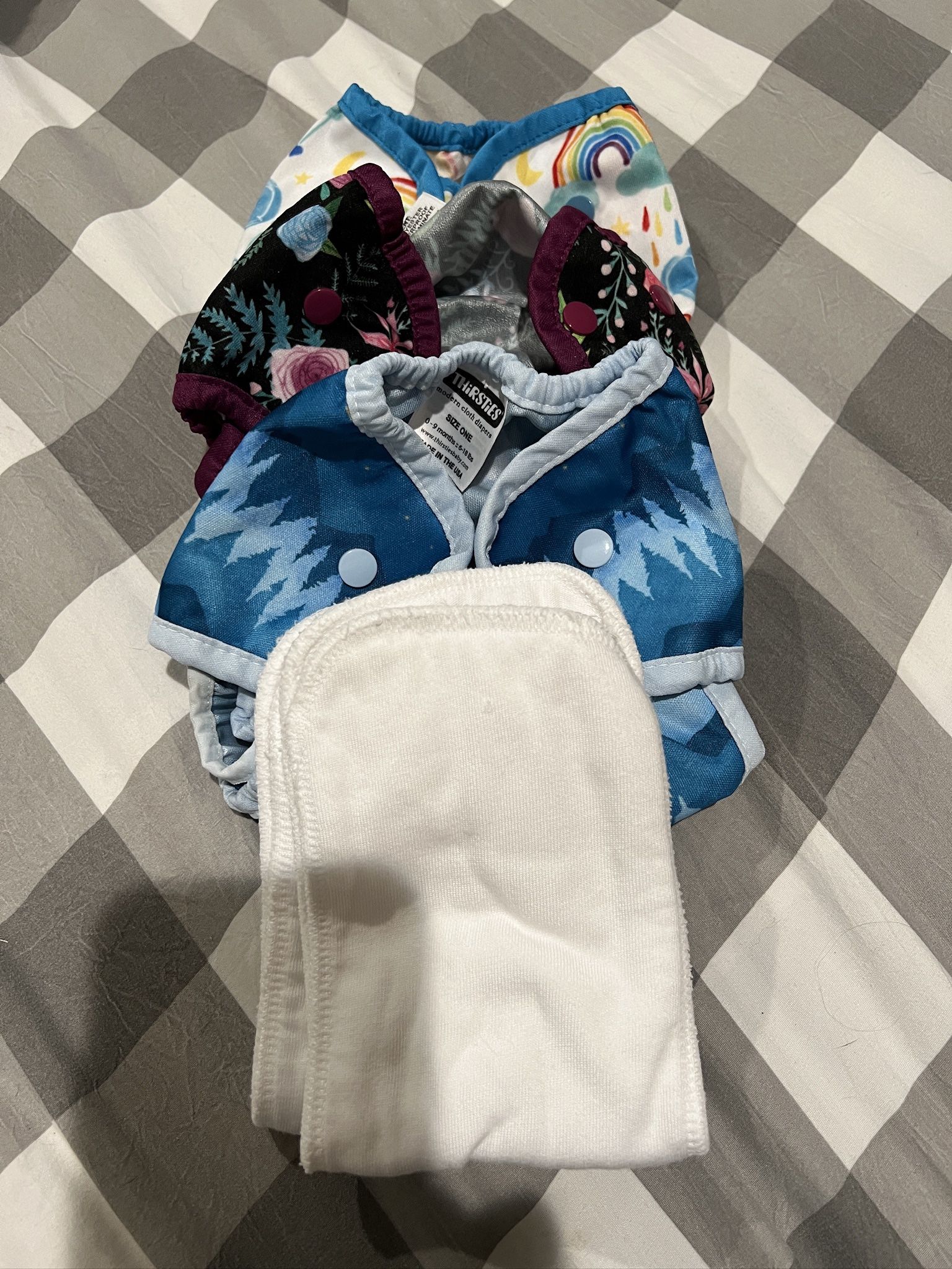 Assorted Cloth Diapers And Accessories