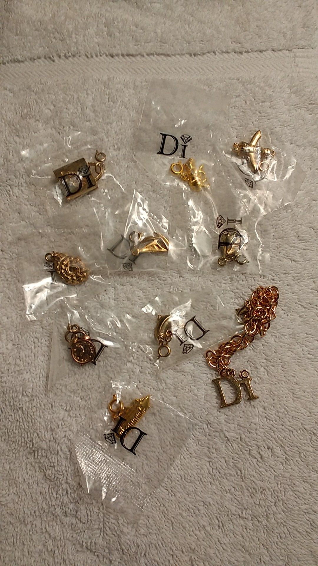 Collection of nautical themed pendants and a bracelet