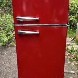 Galanz Red retro fridge with silver handles and stainless steel details