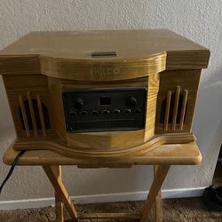 Philco retro-style entertainment center that includes a turntable, CD player, and cassette deck.