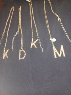 Only 4 left. Gol plated initials. Reduced only $10.e.