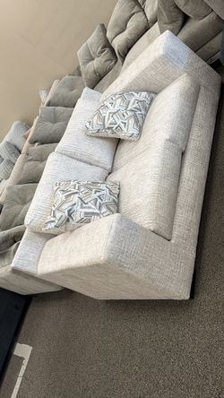 Light Gray Fabric Sofa with Accent Pillows