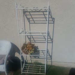 white metal plant stand bakers rack