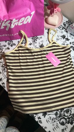 Edikted size medium brown and tan color