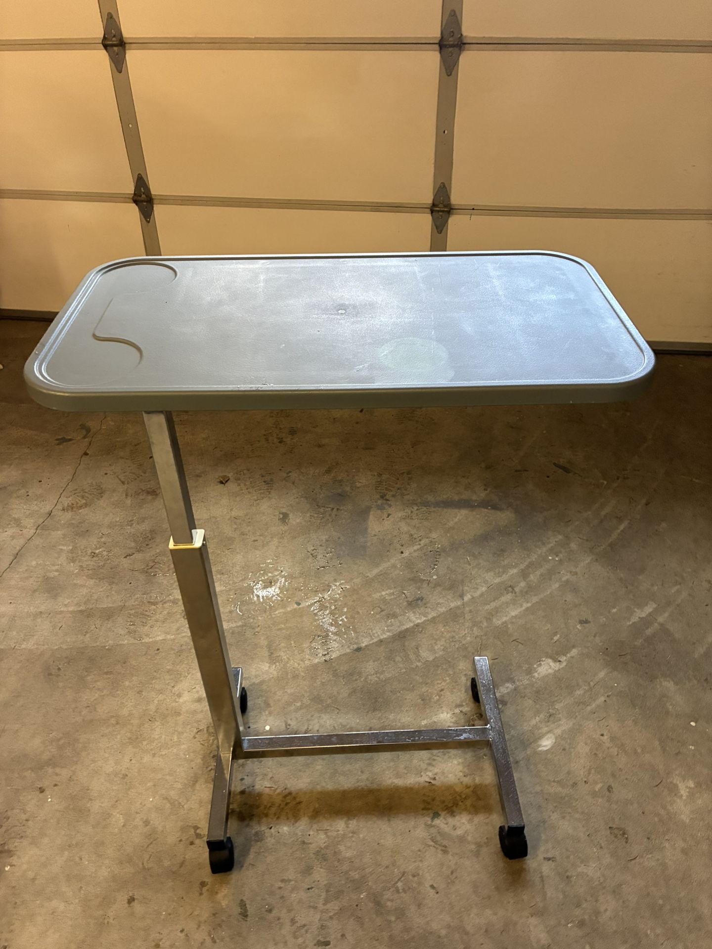 Adjustable-height over-bed table