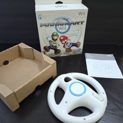 Wii steering wheel with box, manual, and cardboard