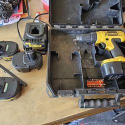 Dewalt Drill 14.4v With Case, Charger, and extra batteries. 