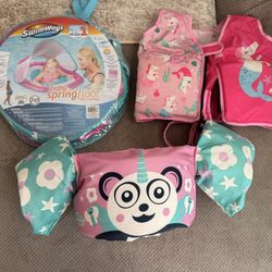 Baby girl pool floaty and safety vests 
