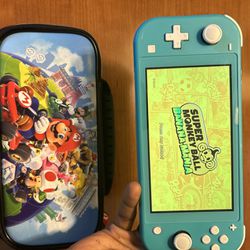 Nintendo Switch Lite With Case And Game 