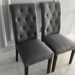 2 Gray parsons chairs
