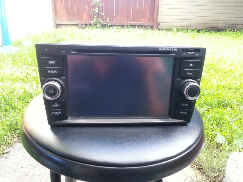 Subaru outback navigation. Has A lot more features. Plug and play.