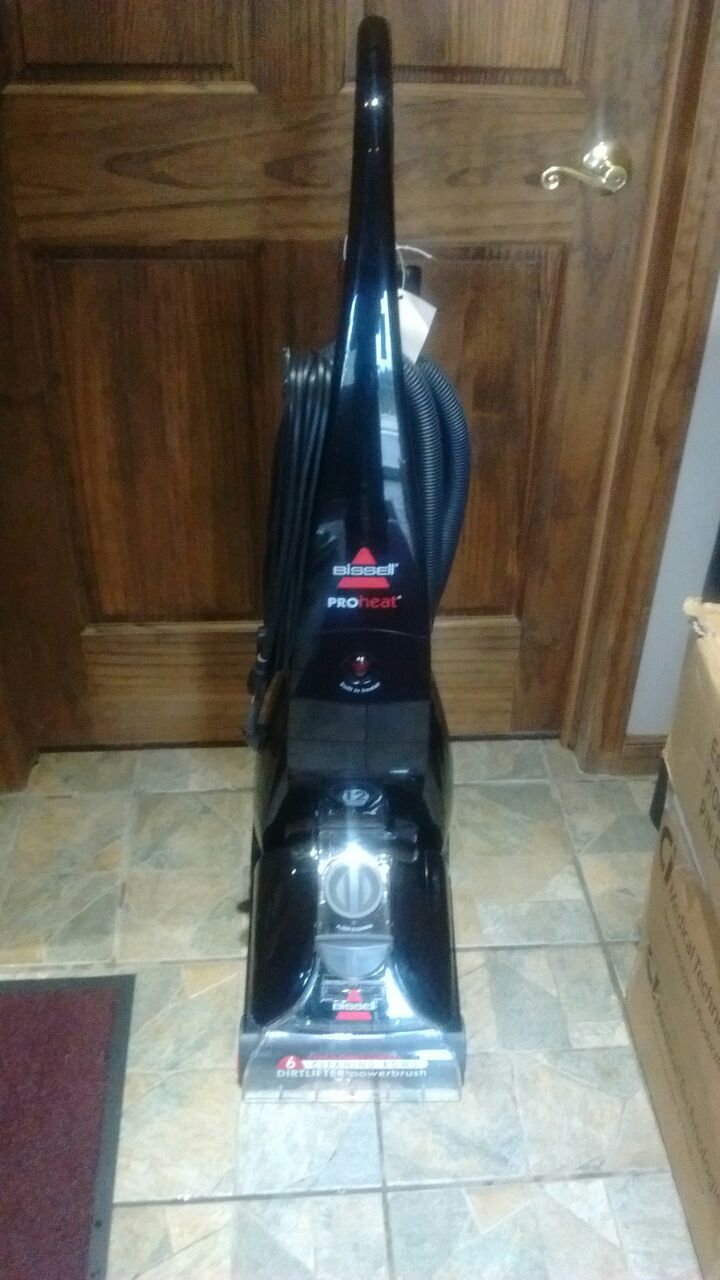 Bissell carpet cleaner Proheat single brush 6 roles of brushes this is a used unit