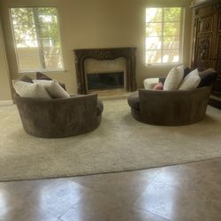 Two Oversized Brown Chairs 