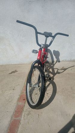 Red 20" BMX bike