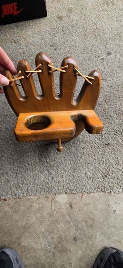 Baseball glove coat hanger