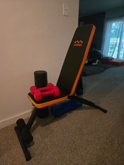 Workout bench with dumbbells