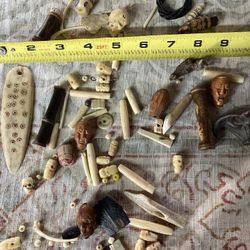 Wood , Bone, Ivory Pieces Skull Face Nails Bones For Necklace Or Art Project Halloween decoration   Random assortment of Wood , Bone, Ivory Pieces.  E