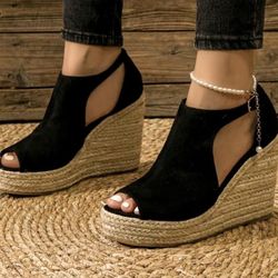 Woman’s Espadrille Peep Toe Wedge