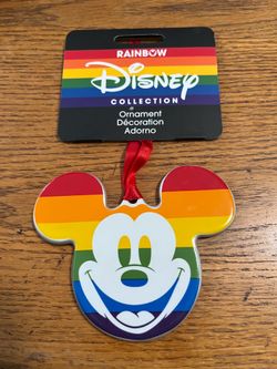 Disney Parks Mickey Mouse Pride Rainbow Ceramic Christmas Ornament.  Size approximately 3 1/2 inches long and 4 1/4 inches wide.  Brand new on origina