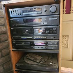 I have this Oldies Stereo System w/ Two Speakers. And Cabinet Display for sale ca. Only $125 for everything 