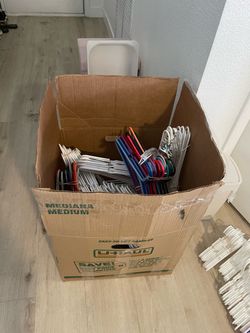 Large Lot of Mixed Clothes Hangers