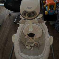 Lightly used Grace Baby Swing