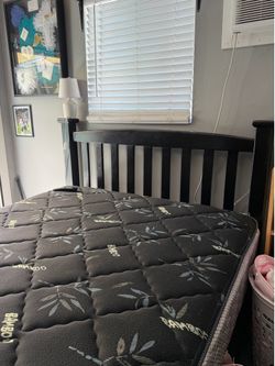 Queen size bed with frame, boxspring, and mattress Queen size bed with frame, boxspring, and mattress