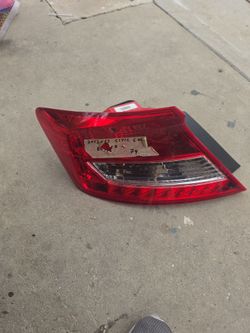 Driver-side (left) tail light compatible only with 2012–2013 Honda Civic Coupe models.