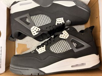 Air Jordan 4 Black and White Sneakers