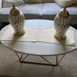Coffee table, side tables and couches selling them has a set